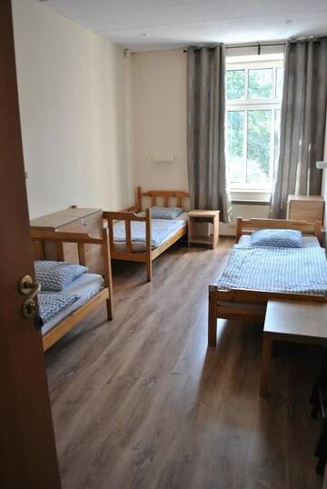 Фото номера Трехместный номер с общей ванной комнатой Хостелы Hostel Katowice Centrum г. Катовице 5